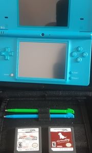 Nintendo DSi lite with 2 games